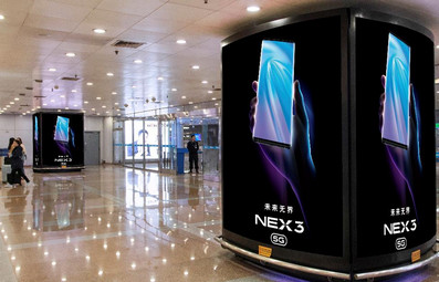 北京首都機場T2國內行李提取廳出口包柱燈箱廣告